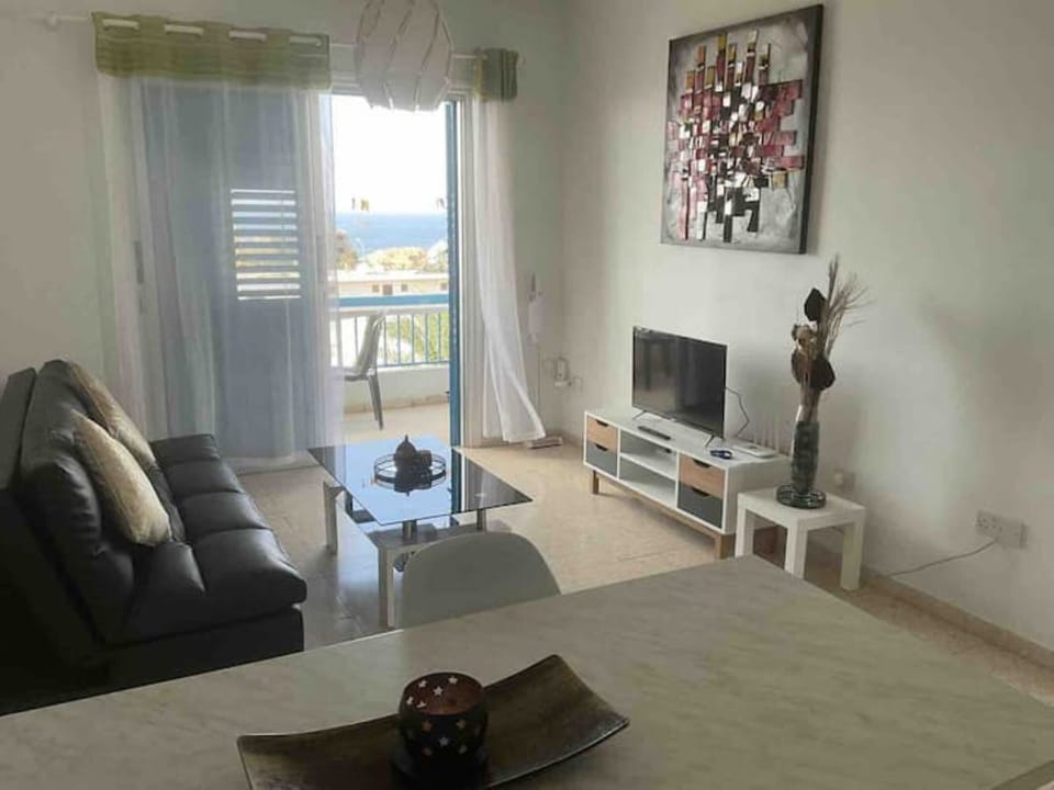 Newly refurbished living room with sea and sunset views