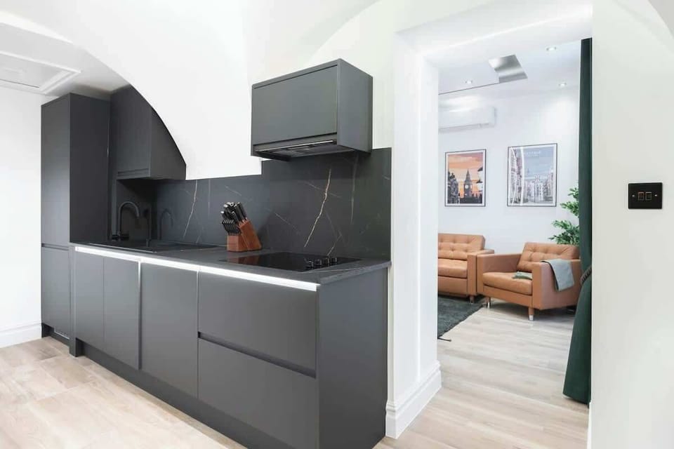 Full Kitchen | Immerse yourself in culinary luxury with our fully equipped kitchen, featuring a washing machine, dryer, dishwasher, microwave, Nespresso machine, and fresh water dispenser. Perfect for cooking or quick snacks.