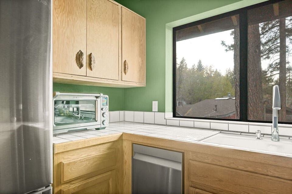 Kitchen space featuring a toaster oven. The views in the kitchen never looked so good!