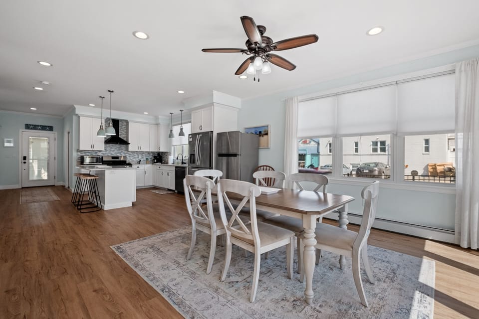 Spacious open dining and kitchen area with plenty of natural bright light.