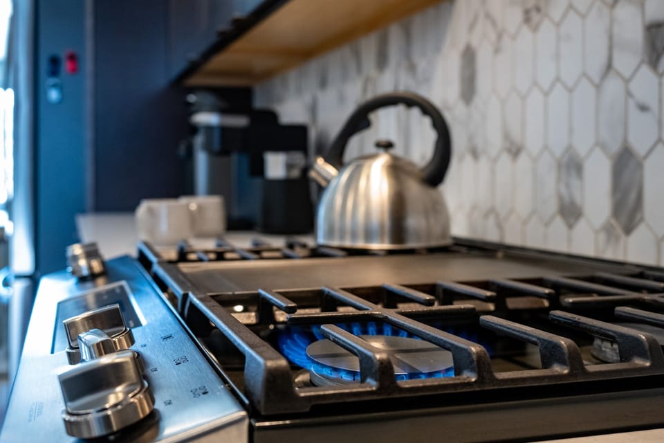 Cook your favorite meals in a kitchen bathed in natural light that enhance the culinary experience.