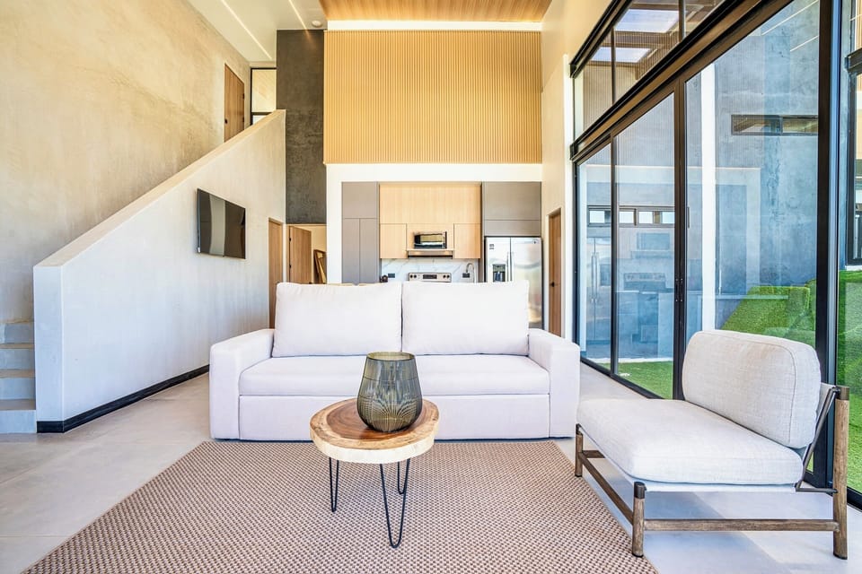 Family Villa | Living area | 55-inch Smart TV with digital channels, smart speakers