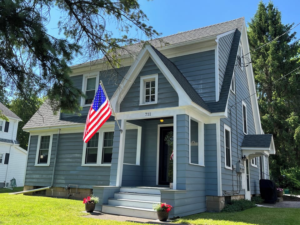 The Blue House at 711 Waterloo-Geneva Road