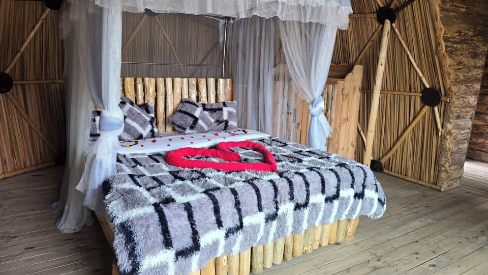 Romantic Tree House | Desk, laptop workspace, bed sheets