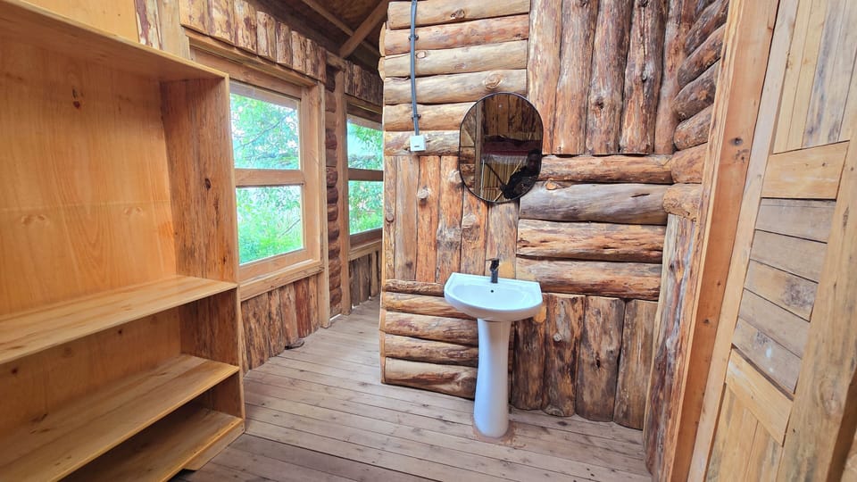 Romantic Tree House | Bathroom | Shower, rainfall showerhead, free toiletries, slippers