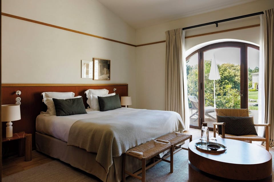 Deluxe Room | Premium bedding, minibar, in-room safe, blackout drapes
