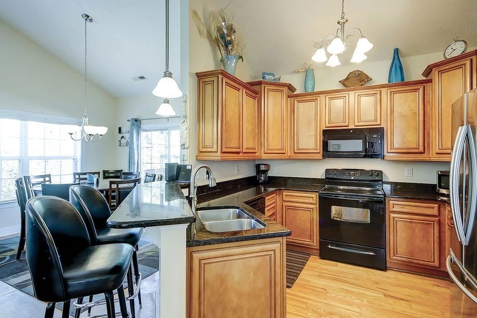 Full kitchen with stainless steel appliances
