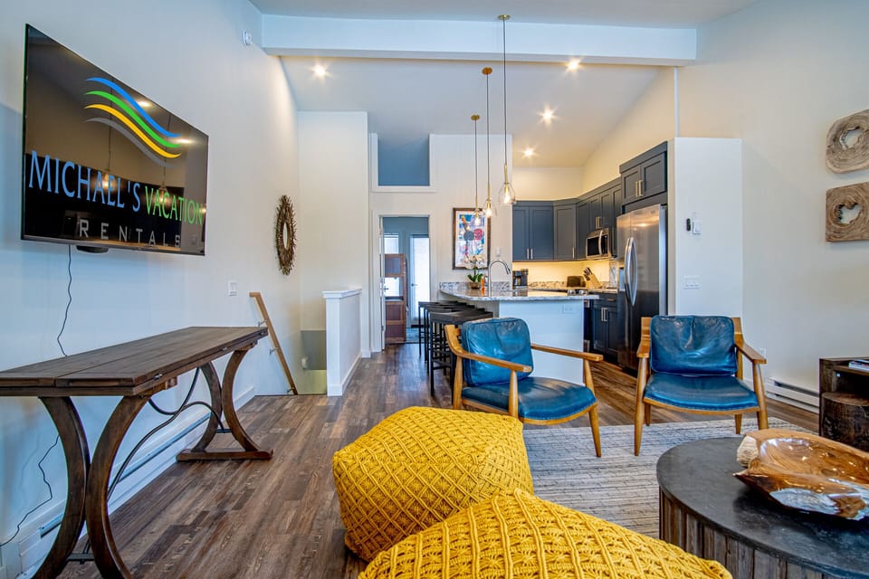 Open living room with hallway to bunk room