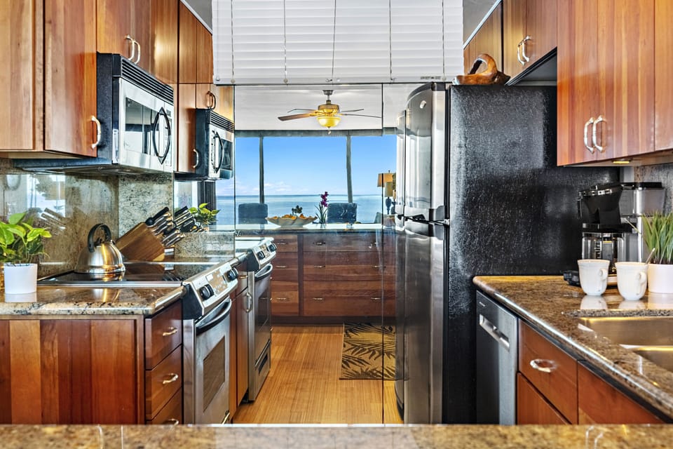 Beautifully updated kitchen with stainless steel appliances.