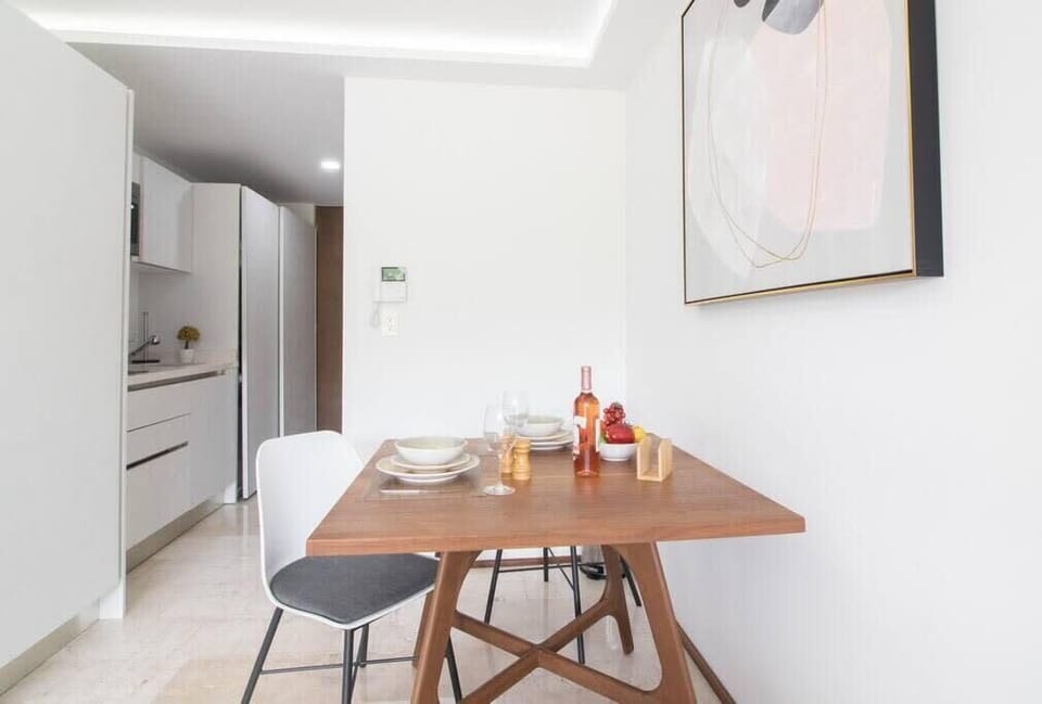The kitchen and dining area offer everything you need for a comfortable stay.