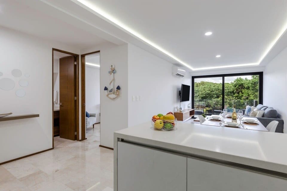 Open plan living, private bedroom and balcony