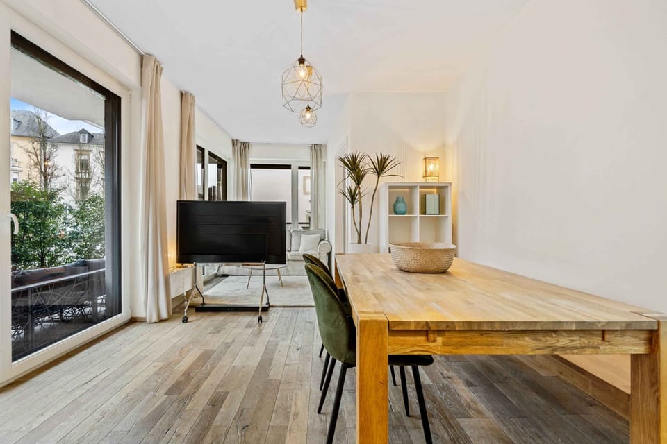 Gather round for memorable meals and moments in this modern dining space.