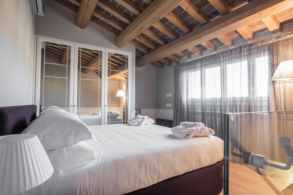 Suite con accesso Spa | Egyptian cotton sheets, premium bedding, memory foam beds, minibar