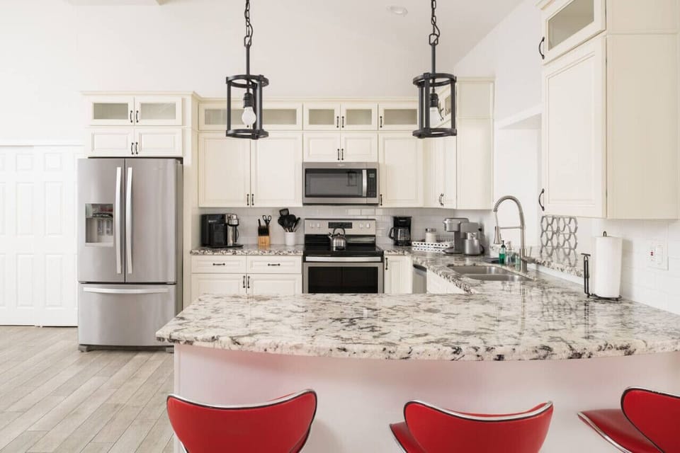 A modern, guest-ready kitchen with plenty of room to move and cook with ease.