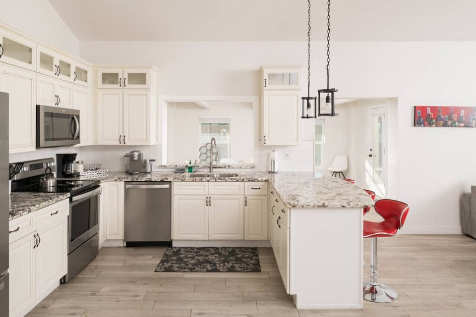 Whip up delicious meals in a fully functional kitchen that’s both spacious and stylish.