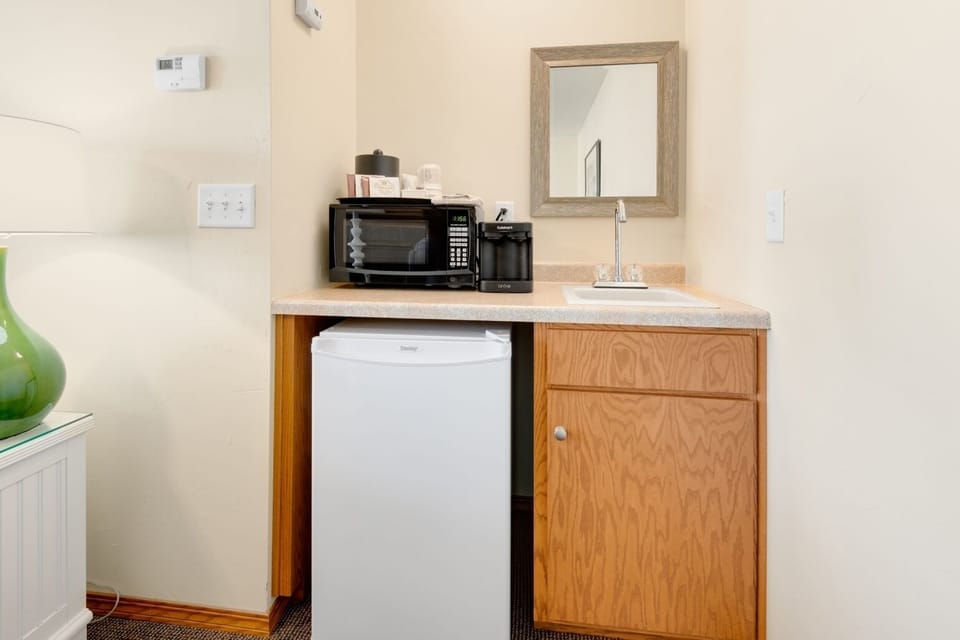 King, Poolside with Patio and Rain Shower on First Floor only | Mini-refrigerator