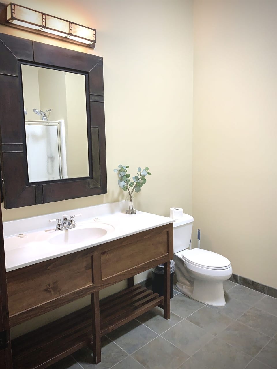 Bathroom #2 has a sink vanity & shower. Steps away from the queen bedroom.