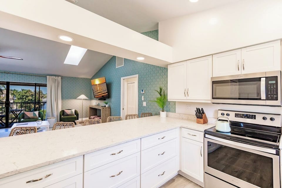Kitchen: Sleek design with gourmet amenities and vibrant views for your culinary adventures!