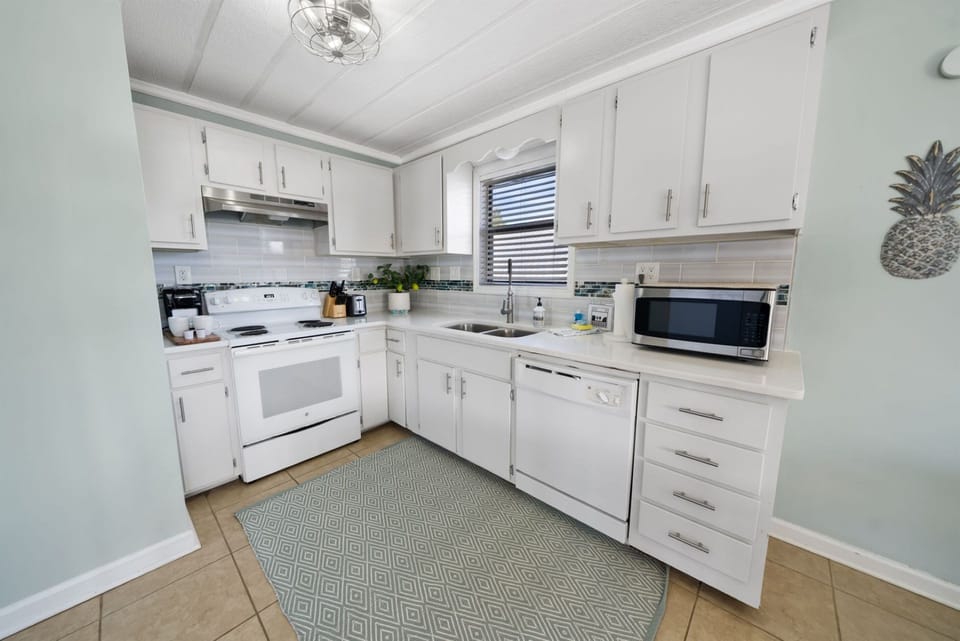 Enjoy cooking or NOT in the fully stocked kitchen.