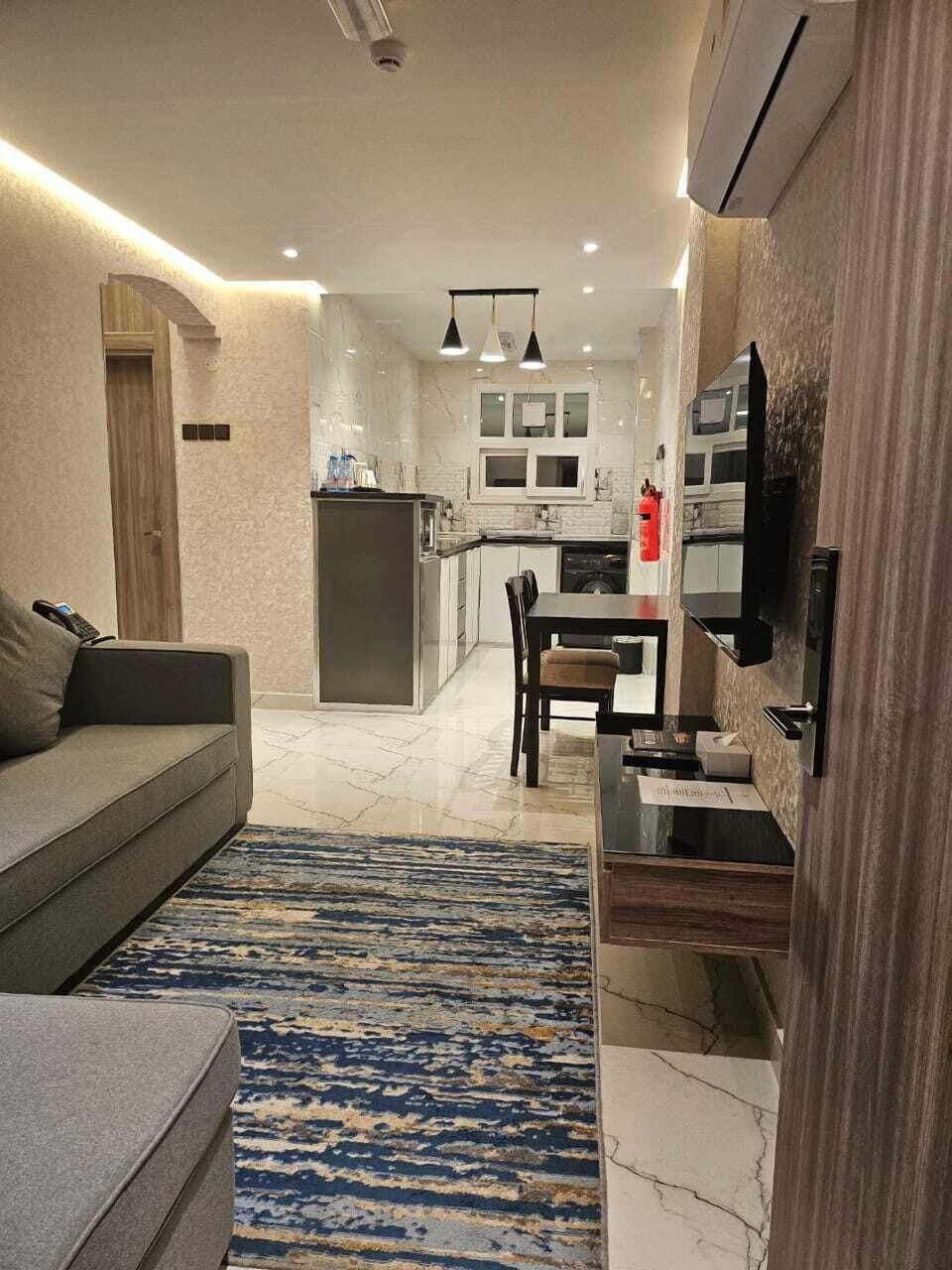 Basic Apartment | Living area | 32-inch flat-screen TV with digital channels, table tennis