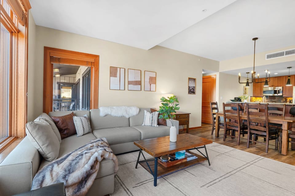 A cozy and inviting living room beckons you to relax and unwind after a long day of enjoying all that Snowmass has to offer.