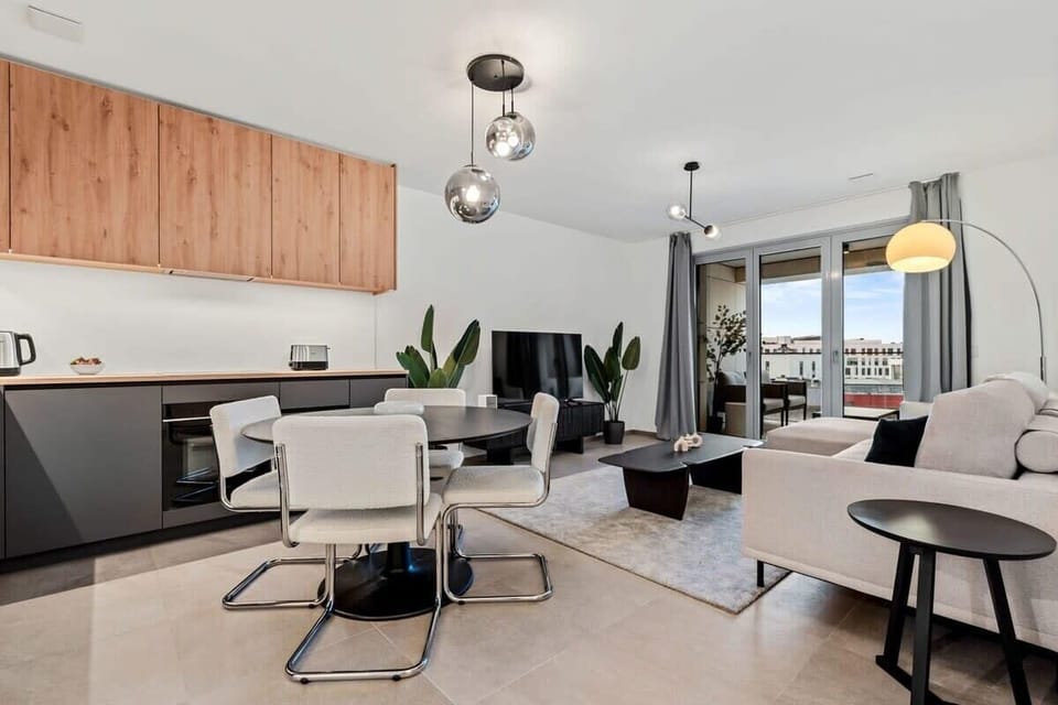 Modern meets comfort in our cozy living space, perfect for relaxation or socializing after a day of exploration.