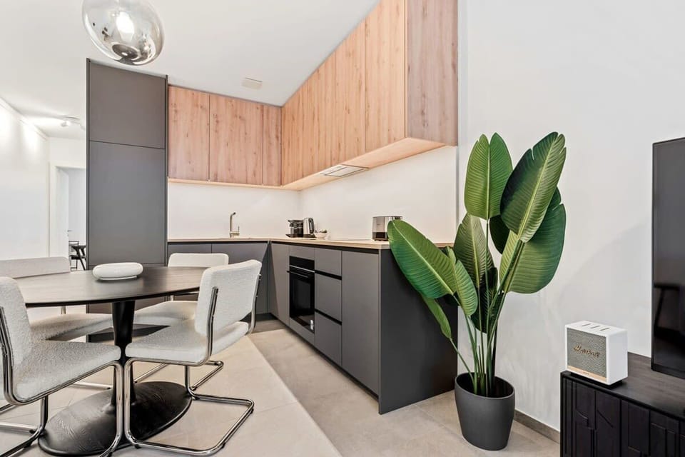 Experience the joy of cooking in our open-plan kitchen, complete with dining area for memorable meals and gatherings.