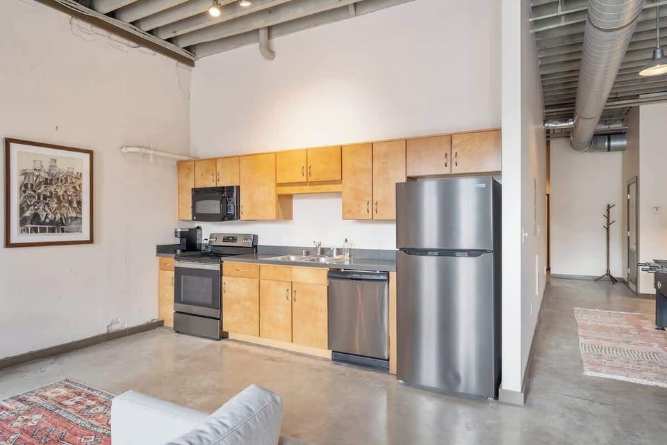 • Prime Whiskey Row location—walk to bars, restaurants & tours
 • Spacious 3BR loft with exposed brick & historic charm