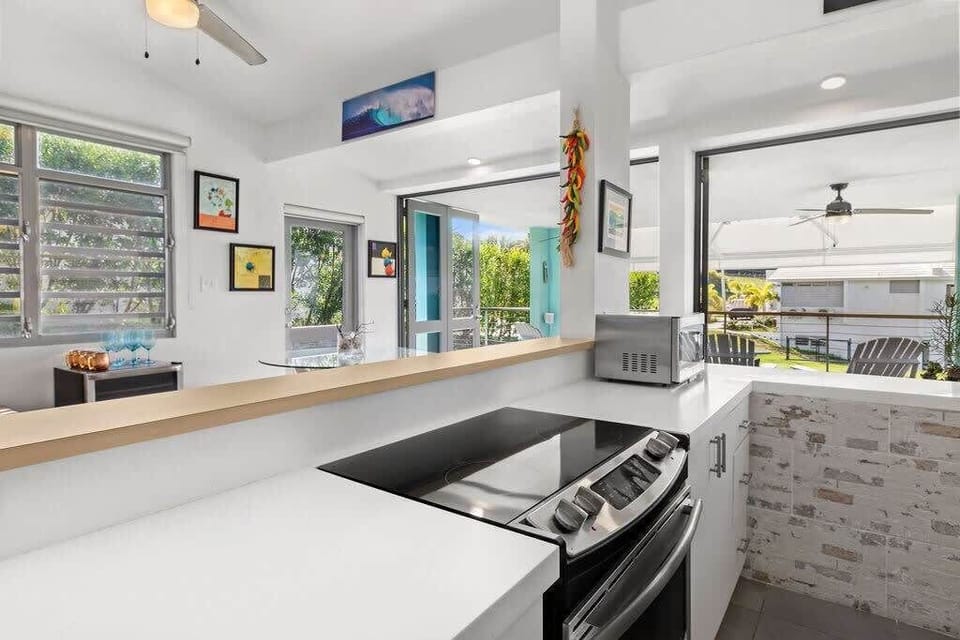 The kitchen is fully equipped. Features an oven, stove, refrigerator, coffee maker, blender, microwave and fully stocked.