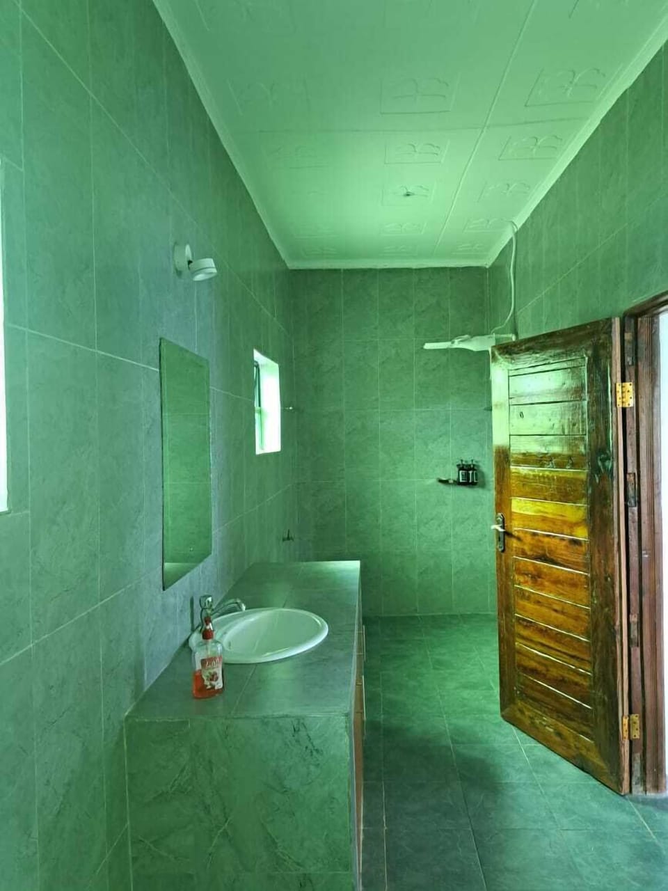 Shower, rainfall showerhead, towels, soap
