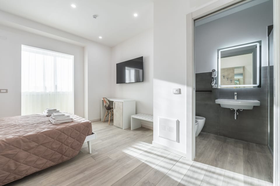 Deluxe Room | Memory foam beds, desk, laptop workspace, soundproofing