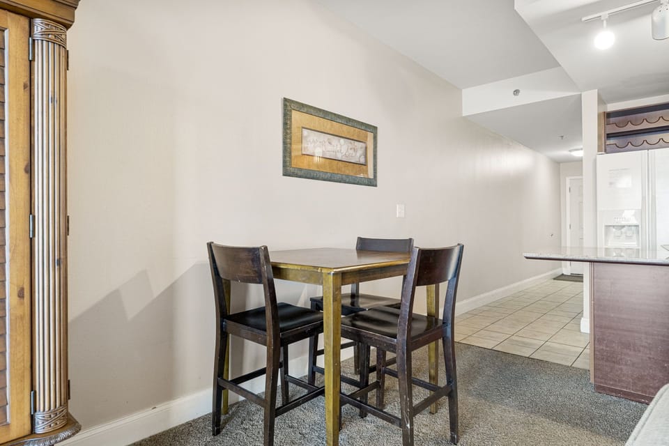 Cozy dining area with a wooden table and chairs in a modern setting