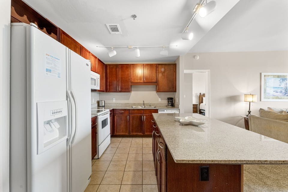 modern kitchen with wooden cabinets and a large island