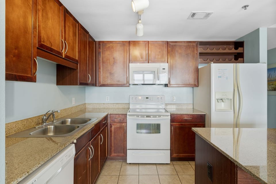 kitchen with wooden cabinets and modern appliances