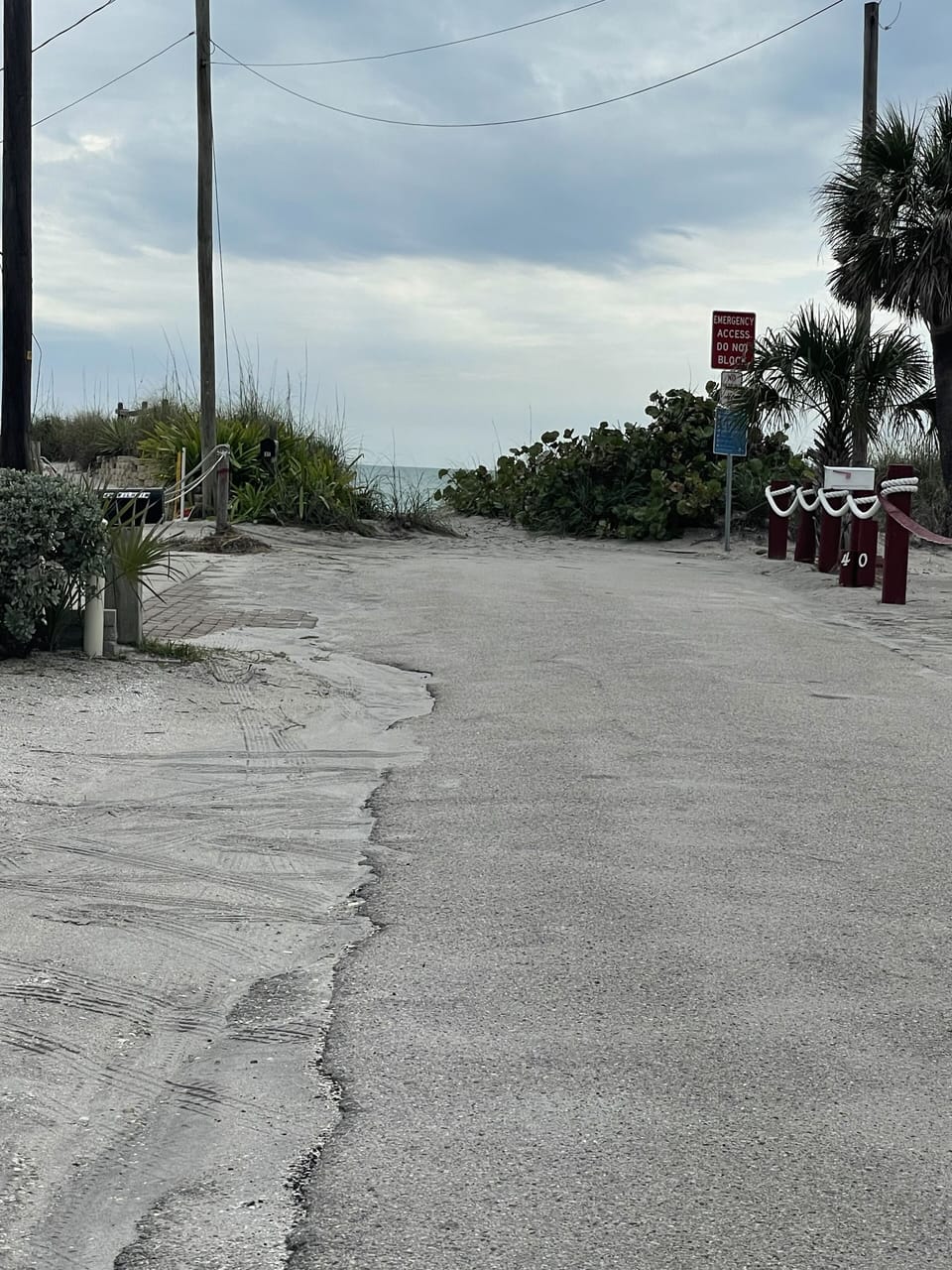 View from driveway. Stone's throw to beach access. Direct, easy access to Gulf.