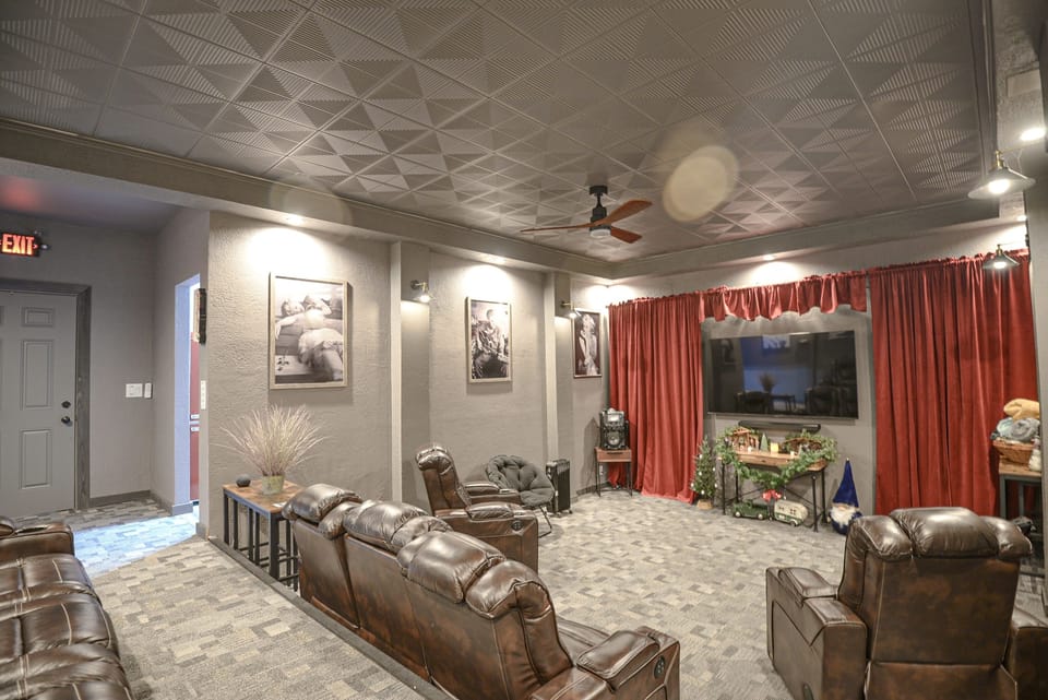 Theater seats 12 with room for more, plus surround sound and a karaoke machine.