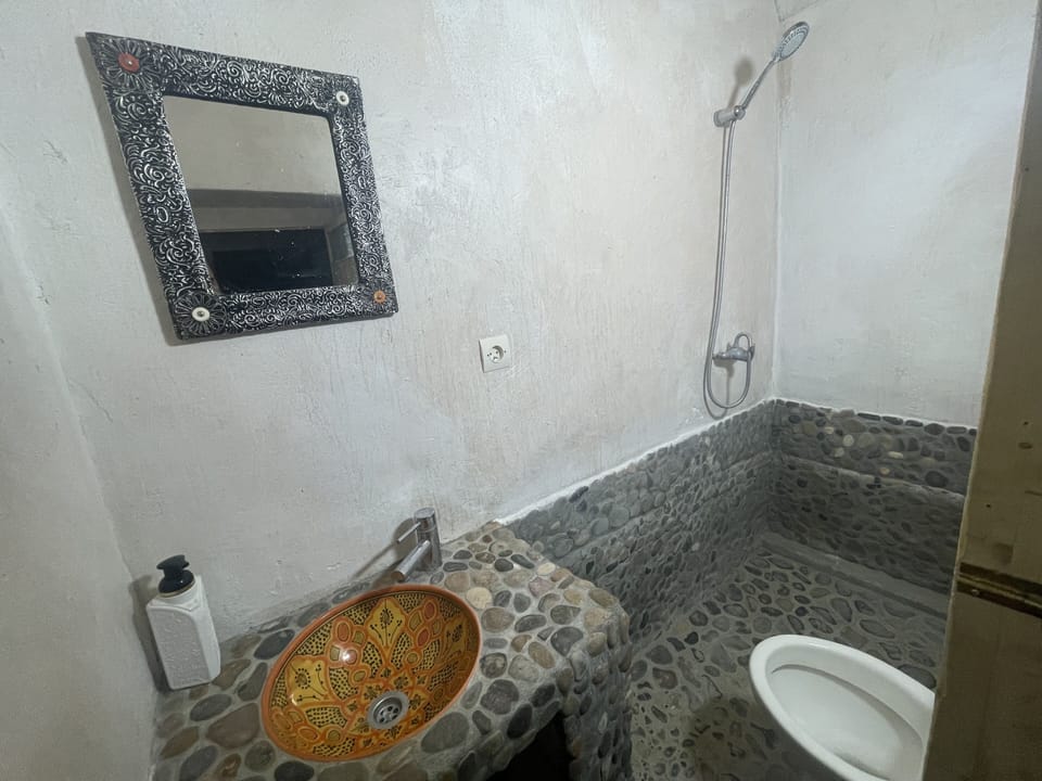 Shower, free toiletries, hair dryer, bathrobes