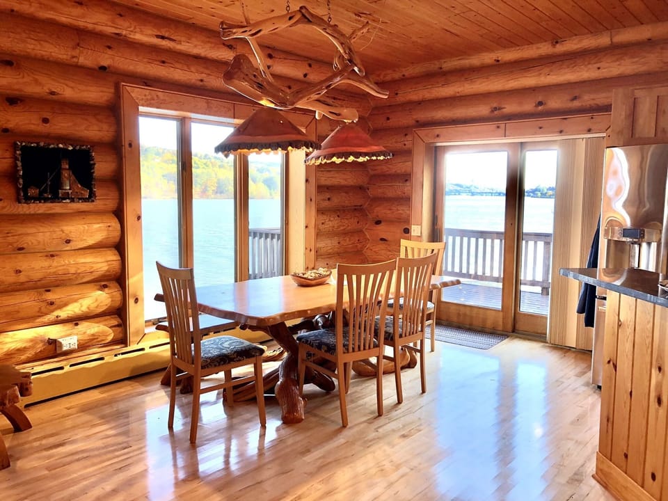 Custom driftwood dining table & turned log lap shades. How did they make those?