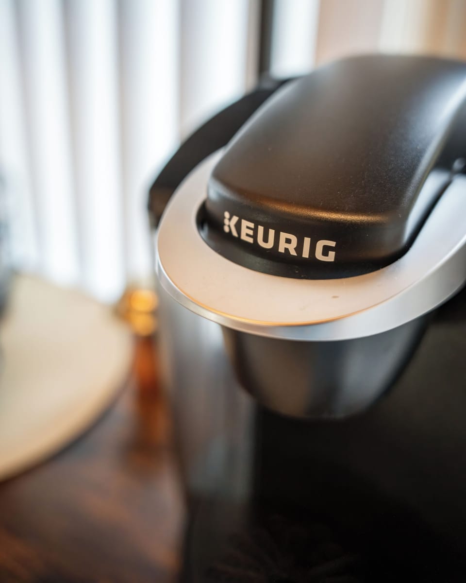 Complimentary Coffee Bar with Keurig pods and creamers
