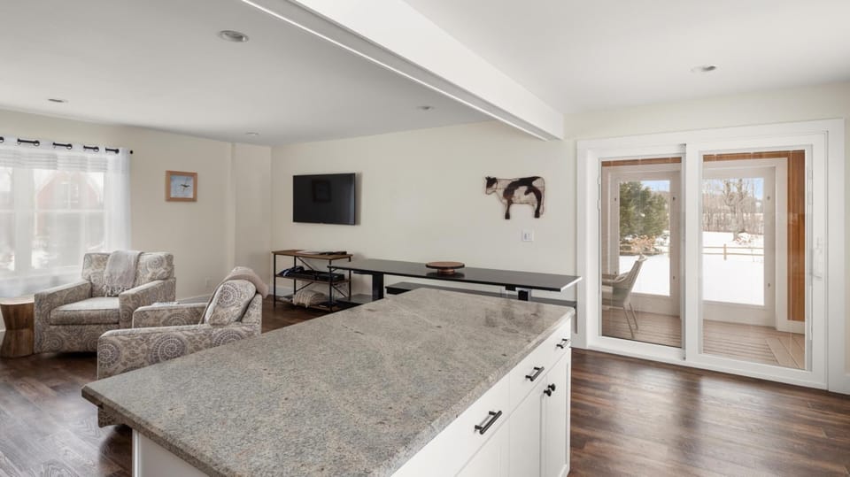 Riverbend Retreat: A Three-Story Haven in Stowe (2727)