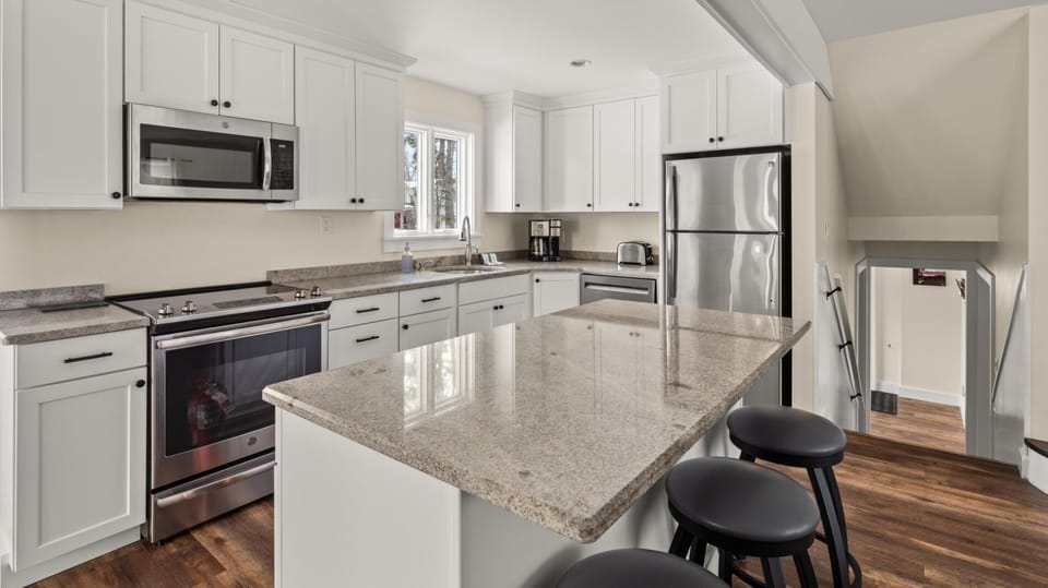 Riverbend Retreat: A Three-Story Haven in Stowe (2722)