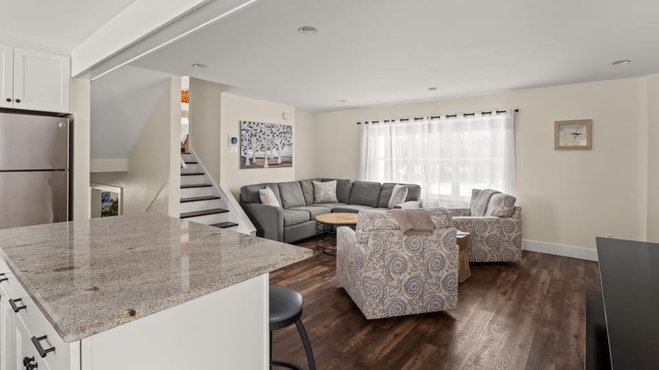Riverbend Retreat: A Three-Story Haven in Stowe (2723)