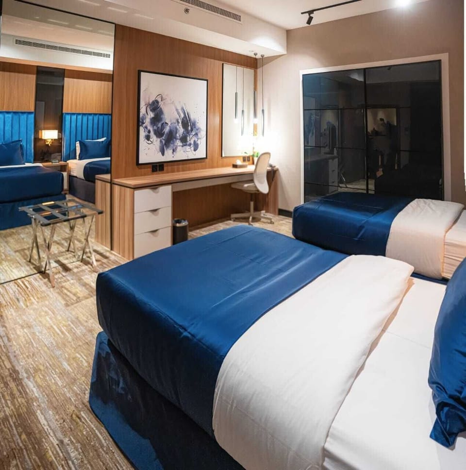 Design Twin Room | Premium bedding, memory foam beds, in-room safe, desk