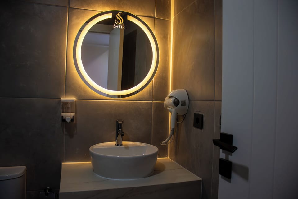 Eco-friendly toiletries, hair dryer, towels, soap