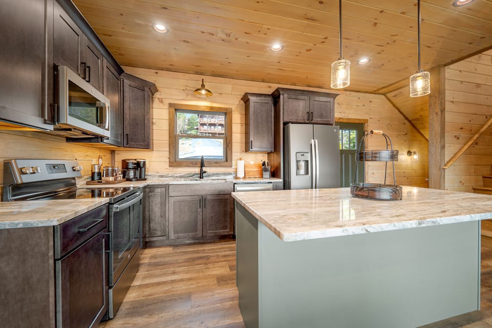 Large open concept kitchen and living room make big family gatherings a breeze.