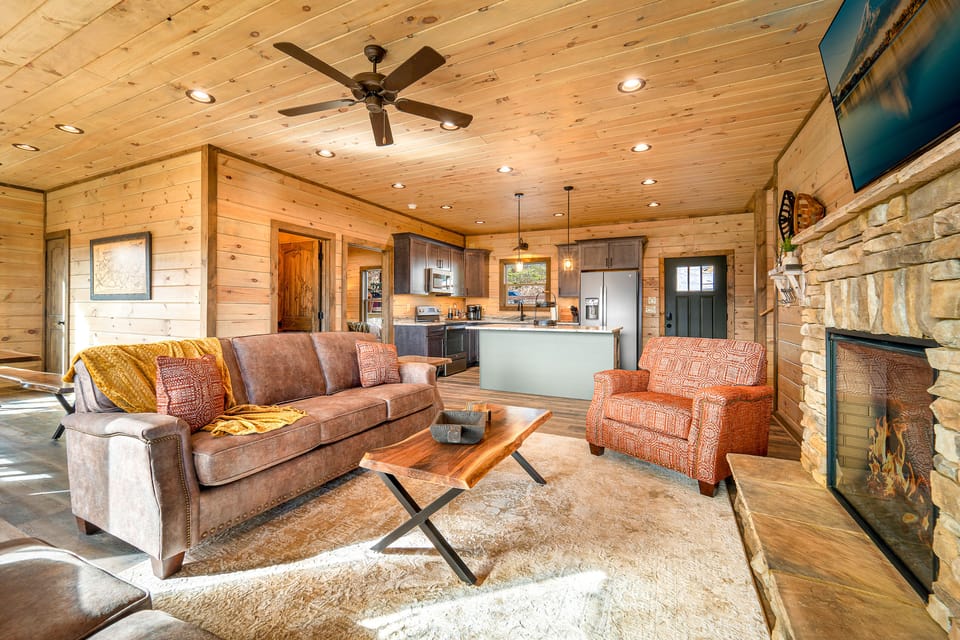 Enjoy the fire and a large TV with the sound system in our living room