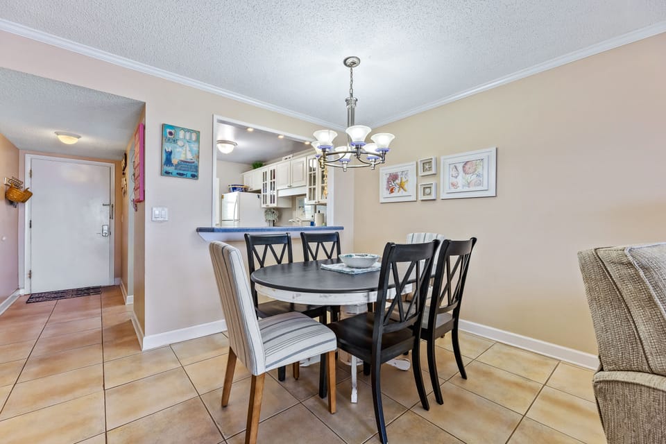 The dining room table has room for 6 guests.