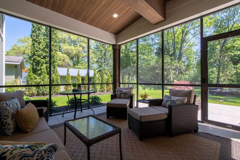 Enjoy a peaceful drink in the Screened-in Porch