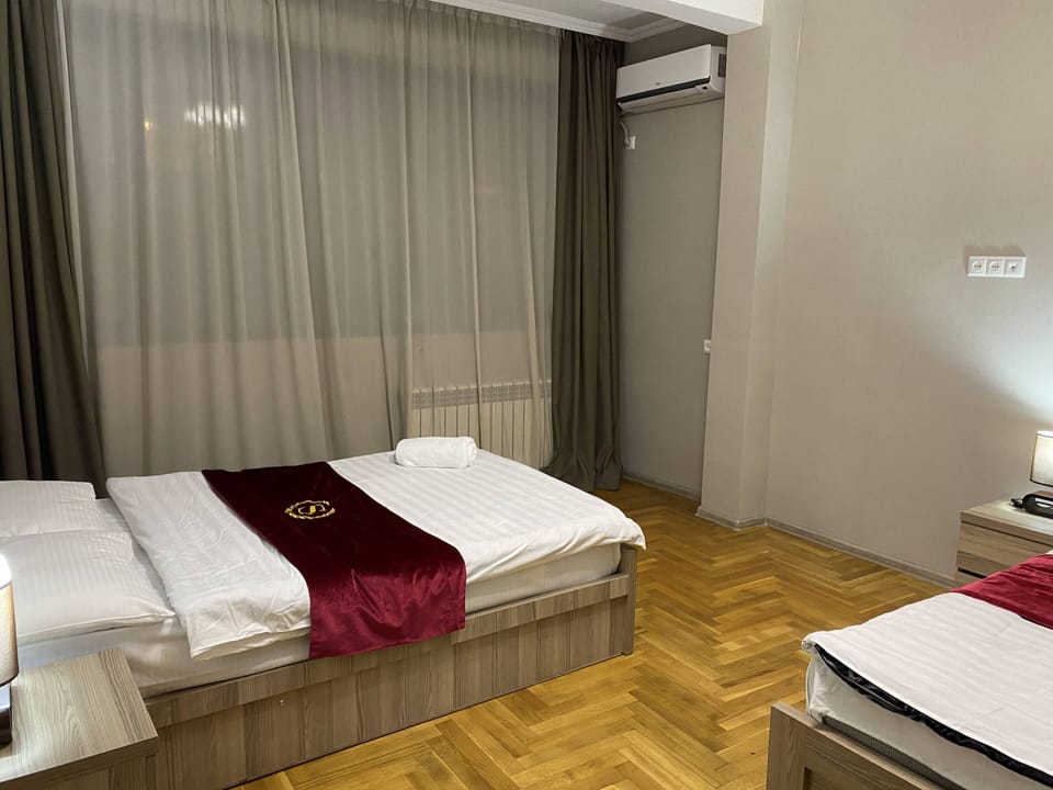 Deluxe Apartment, 4 Bedrooms | 4 bedrooms, in-room safe, desk, iron/ironing board