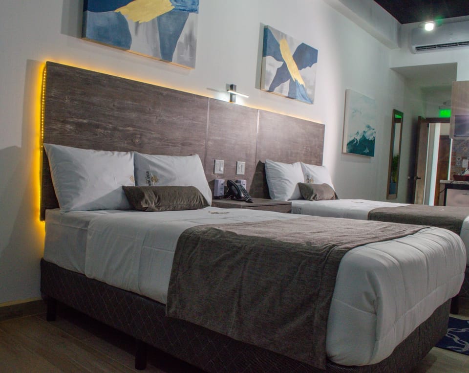 Executive Room, 2 Queen Beds | In-room safe, desk, iron/ironing board, free WiFi
